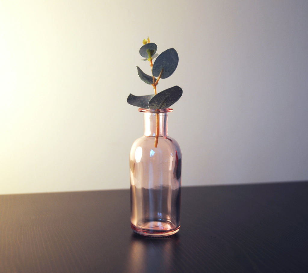 What To Do With Your Old Perfume Bottles Once They're Empty